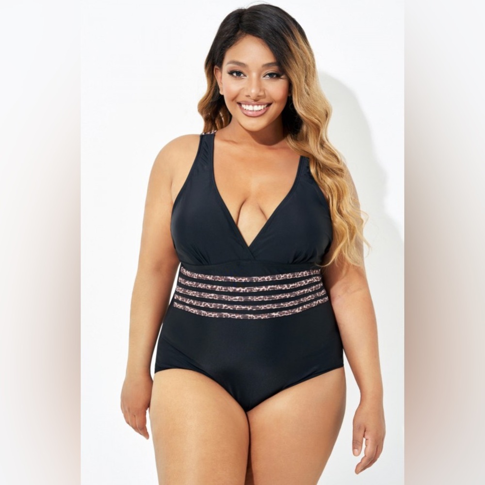 NWOT black one piece with leopard trim
